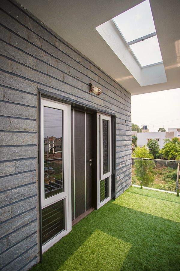 Rear elevation and lawn, residence