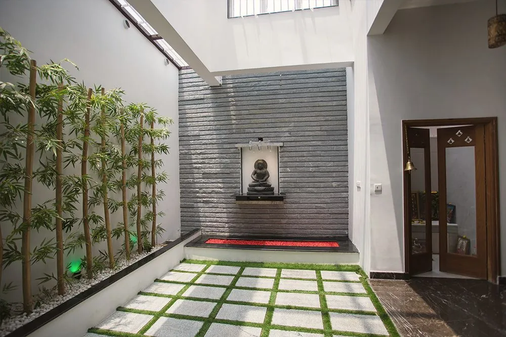 Courtyard with green wall, residence