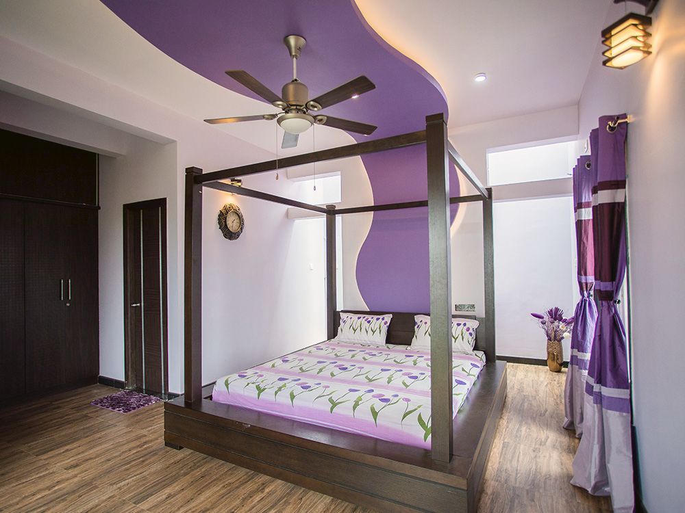 Bedroom with four-poster bed